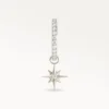 Piercing anneau argenté avec pendentif étoile brillante, bijou raffiné et moderne