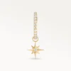 Piercing anneau en or orné d’un pendentif étoile sertie de zircons, design lumineux