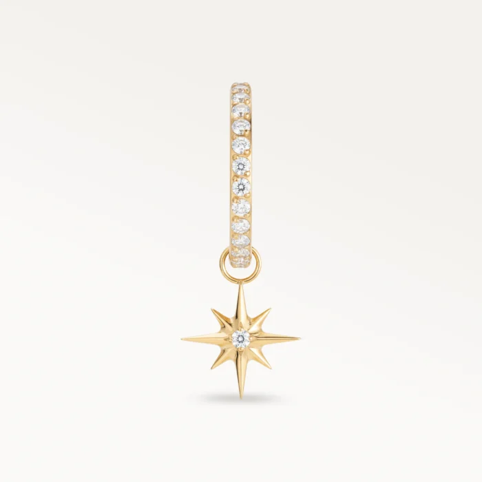 Piercing anneau en or orné d’un pendentif étoile sertie de zircons, design lumineux