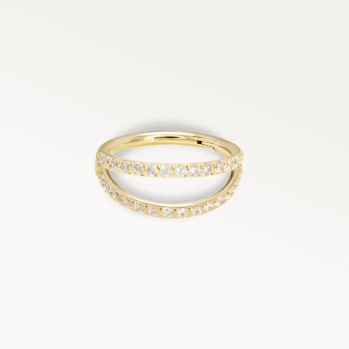 Piercing double anneau doré serti de strass brillants, bijou raffiné et élégant