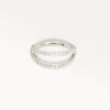 Piercing double anneau argenté avec strass scintillants, design lumineux et délicat
