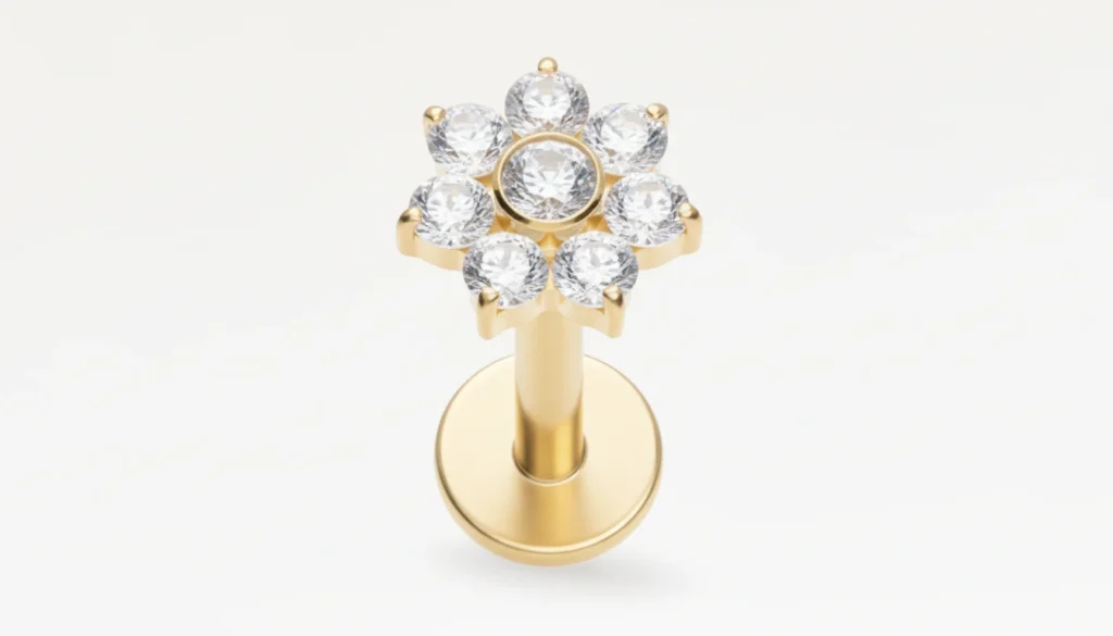 Piercing fleur en titane doré ASTM F136 orné de zircons, bijou hypoallergénique élégant