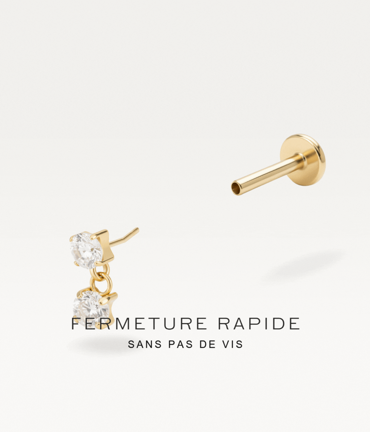 Piercing puce doré à double zircon avec système de fermeture threadless illustré