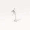 Piercing rook argenté orné d’une étoile brillante, design fin et moderne